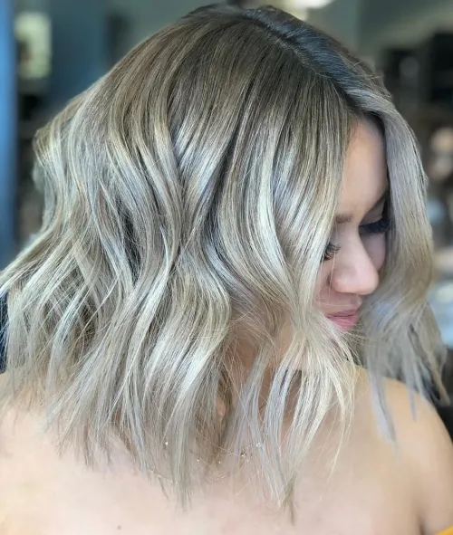 ICY PLATINUM LOCKS WITH DARK ROOTS